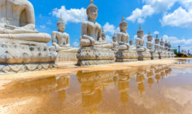 Buddha statue and blue sky, Nakhon Si Thammarat Province, Thailand